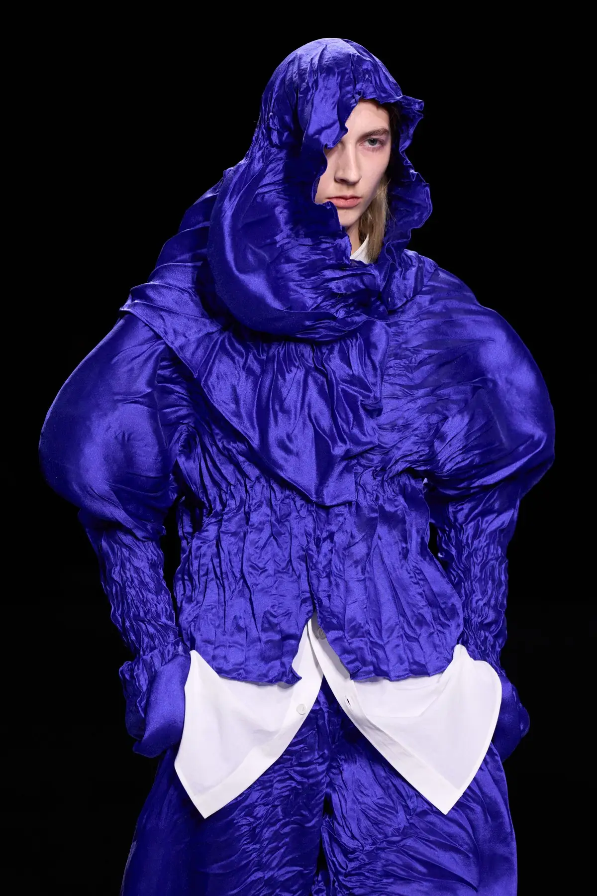 Look 24, closer. The bulges and the creases around them.