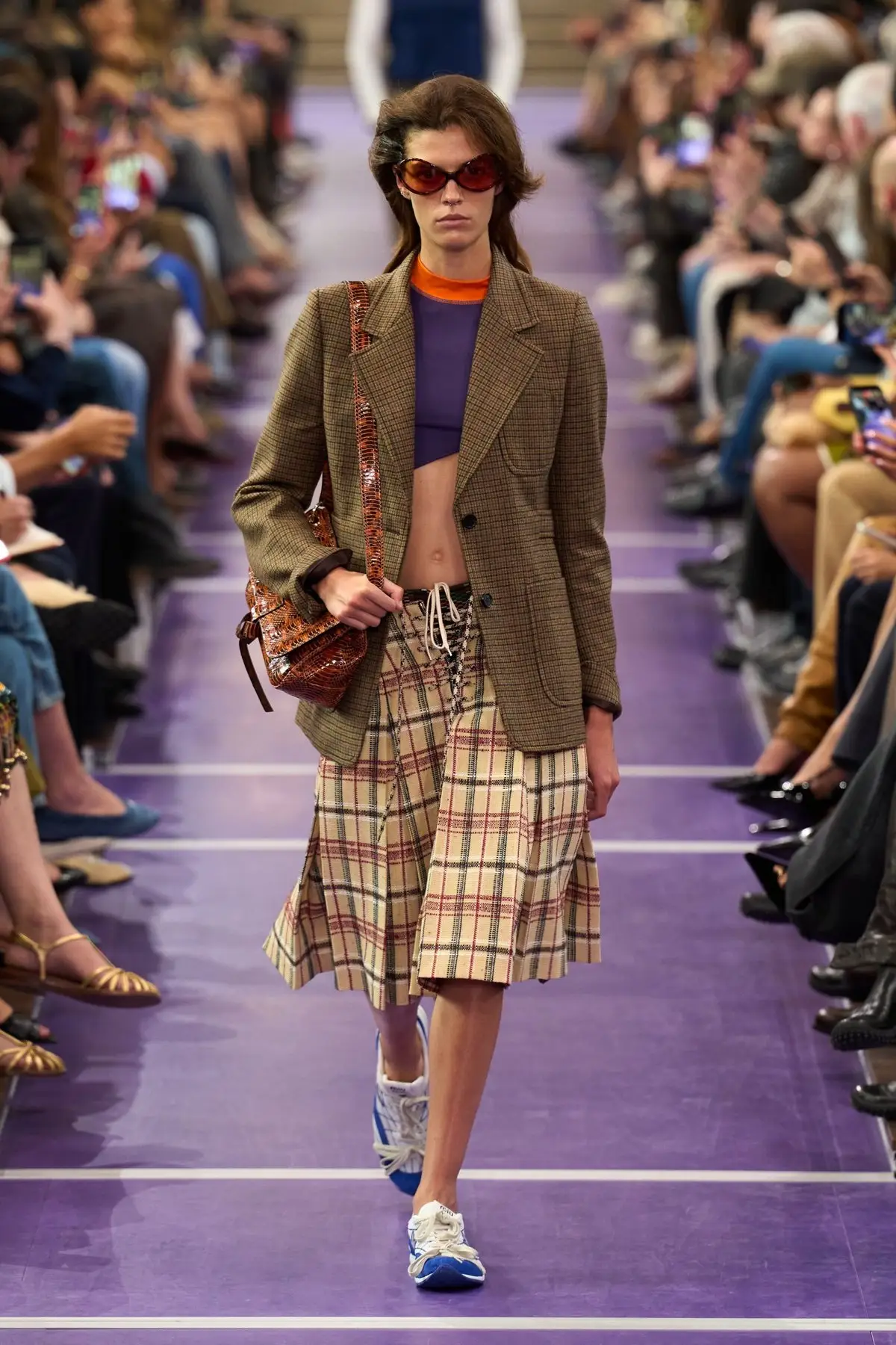 Miu Miu, Look 5. A checked knee length skirt with a blazer.