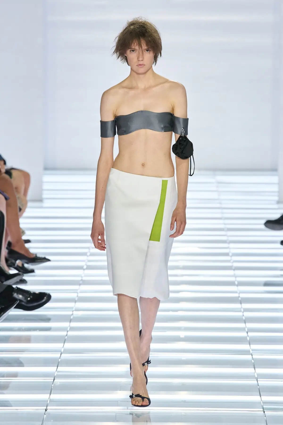 Look 63. The last look. White skirt with a green stripe.